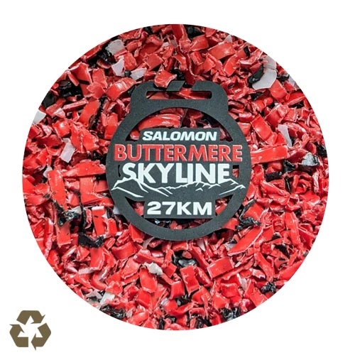 Medalj i återvunnen plast skyline