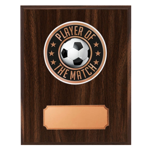 Mörk träplakett med skiva kampens spelare